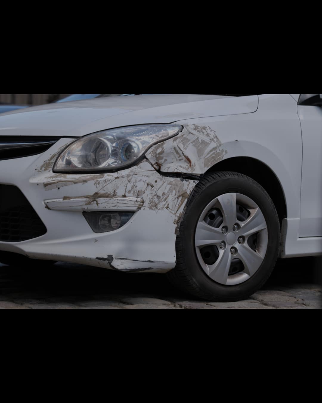 Scraped fender before repair at Auto Art Austin TX