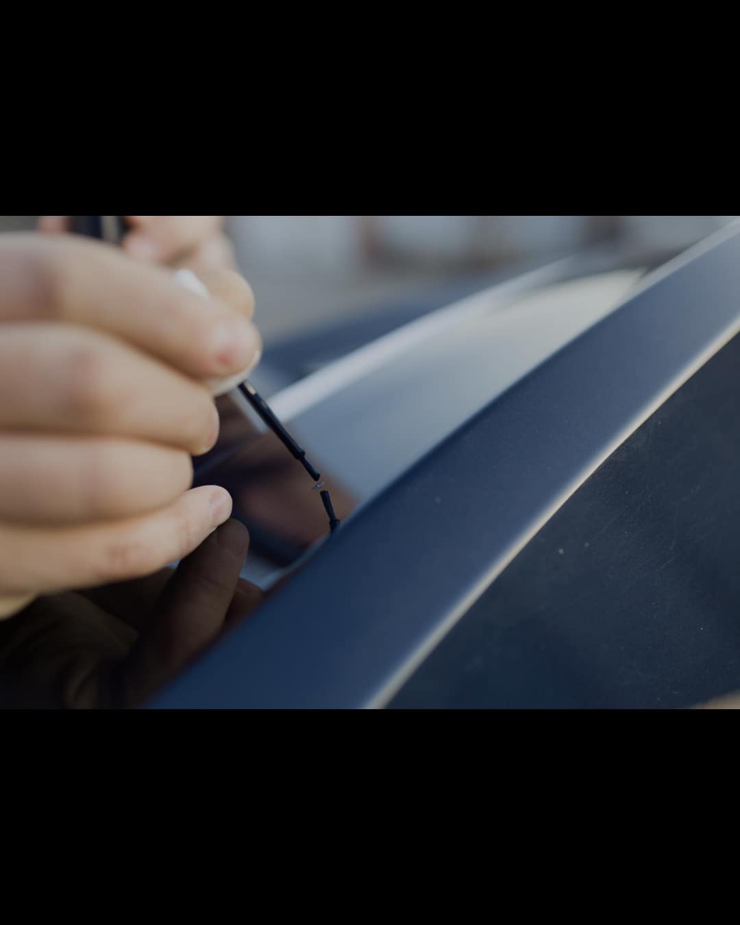 Rock chips on a vehicle hood before repair at Auto Art Austin TX
