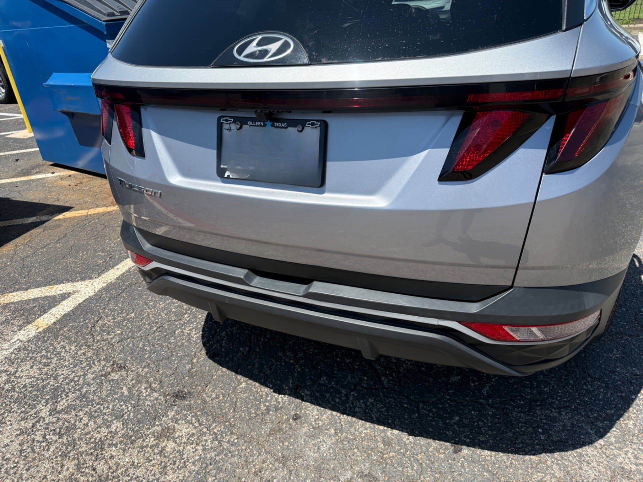 After: Before and after liftgate dent repair on silver 2024 Hyundai Tucson at Auto Art in Austin TX